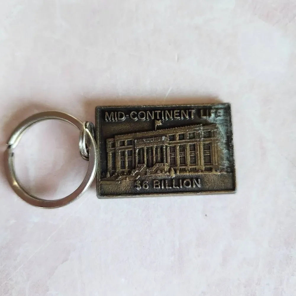 bronze vintage metal keychain plaque Florida Progress Co. 80th anniversary A+ su